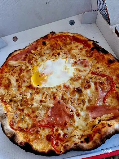 Vegetariana Pollos y Pizzas Ortiz, S.L